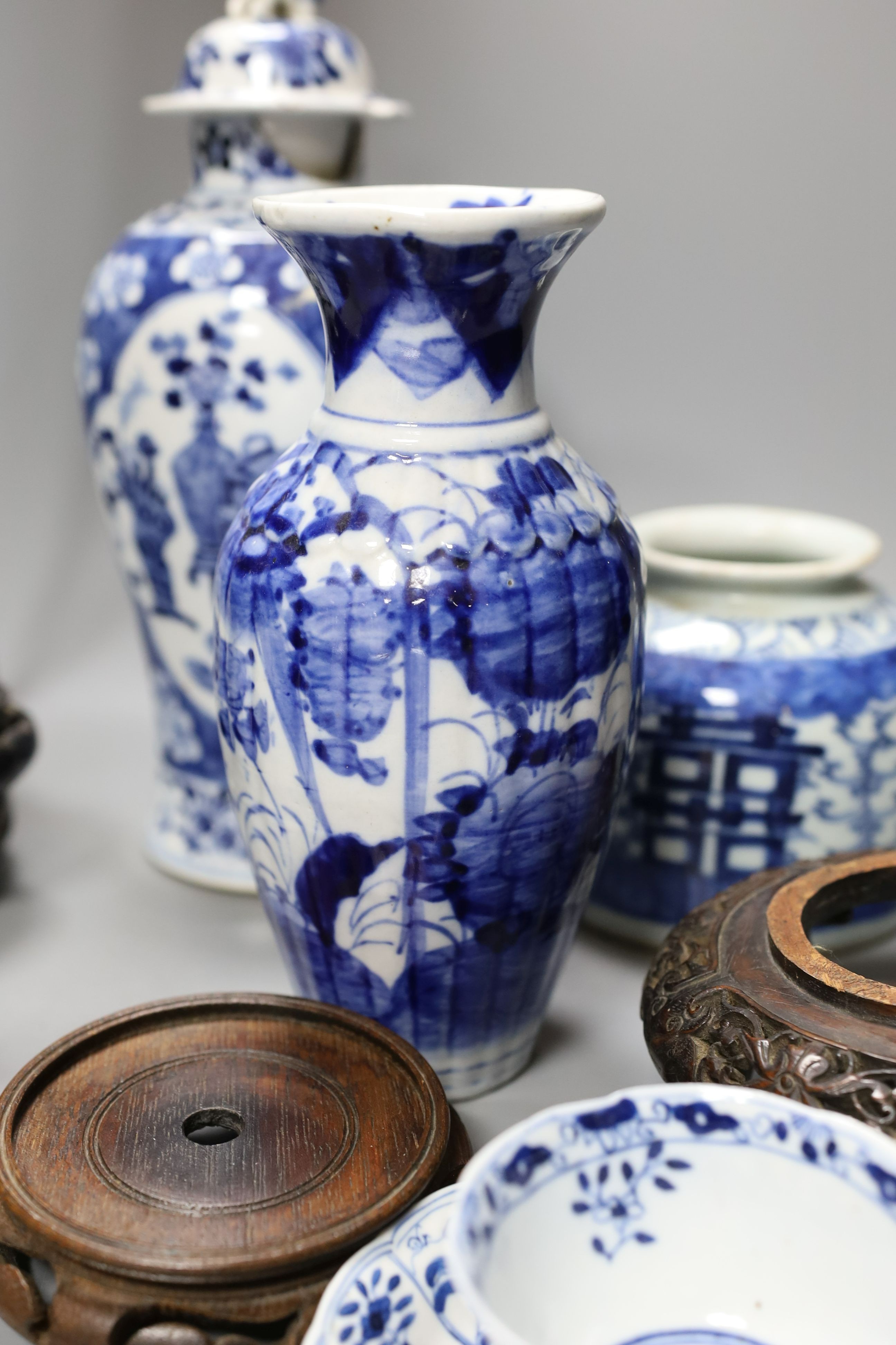 A Chinese Kangxi style teabowl and saucer, other oriental ceramics, carved hardwood easel, etc.